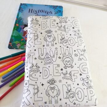 Protège livre, réversible , à colorier ,  lavable et recolorier ,les lettres